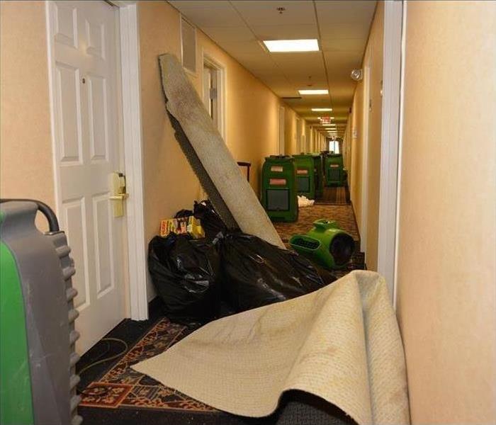 Water damaged hotel hallway