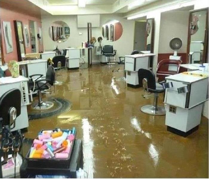 flood water fills beauty salon.